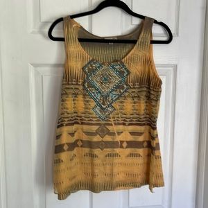 Cute sleeveless yellow tee. Good condition